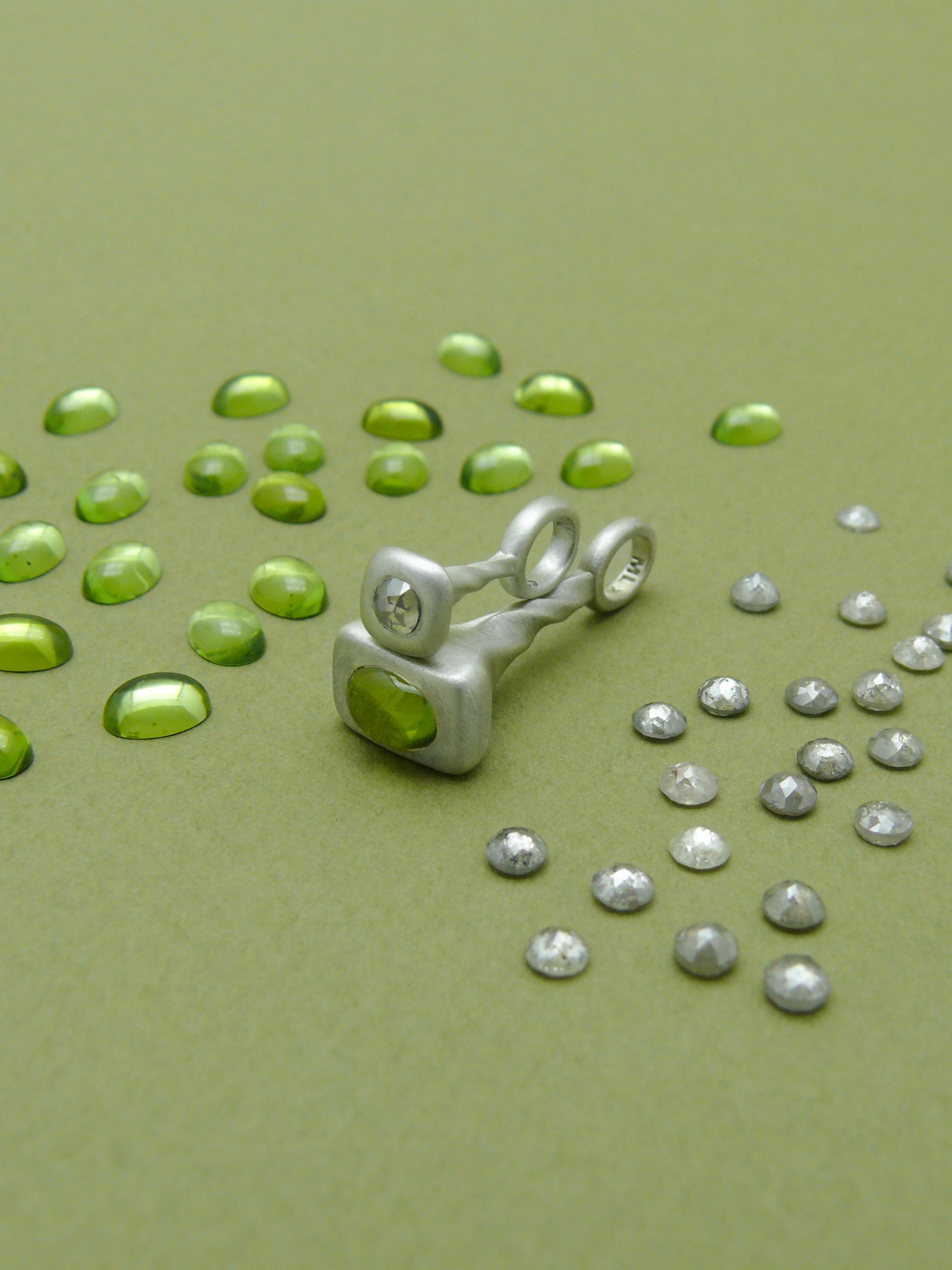 Peridot-Pendulum-Charm-No.7-Silver-on-green-with-diamonds