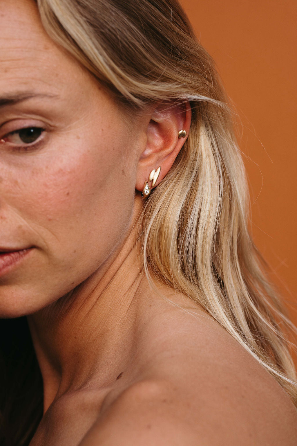 Diamond Petite Signet Clicker Huggie Hoop - Gold in earring stack