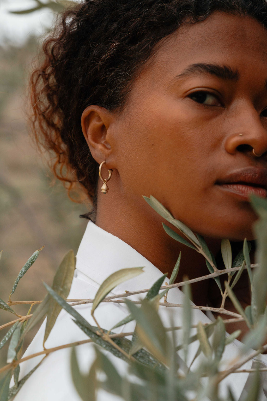 Emerald Pendulum Charm No. 11 Hoop Earring - Gold on model