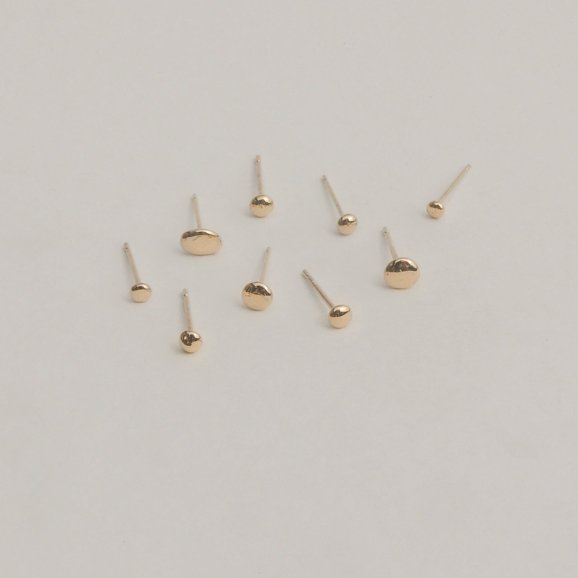 Made Line Jewelry, recycled 14k gold Grain Stud Earrings on white background