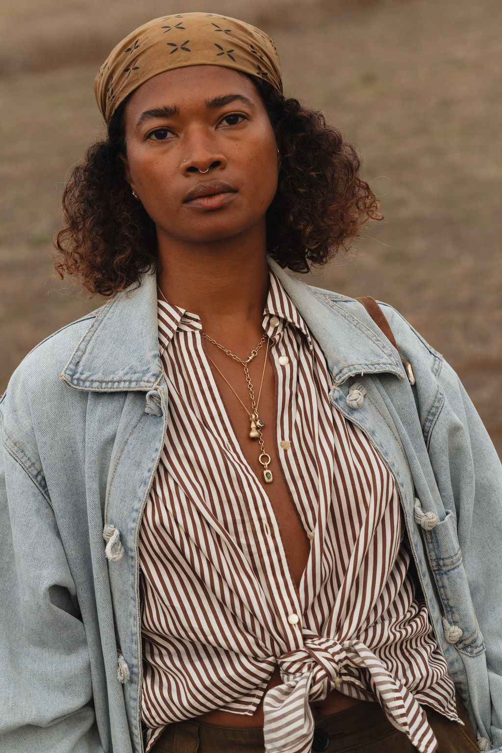 HingedBailCharmConnector-Gold as lariat on model