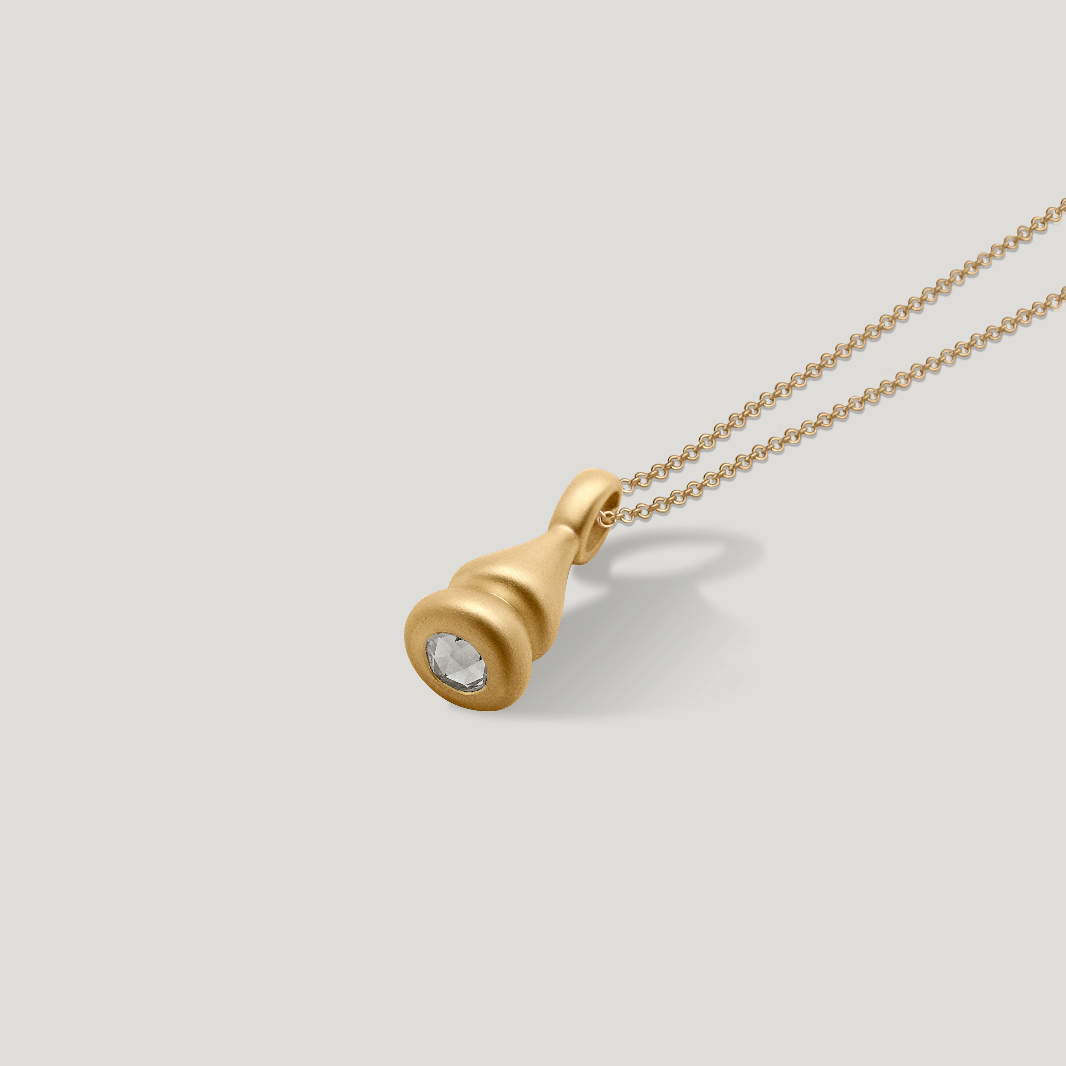 gold rose cut diamond pendulum charm no. 1 on 1.5mm cable chain on grey background