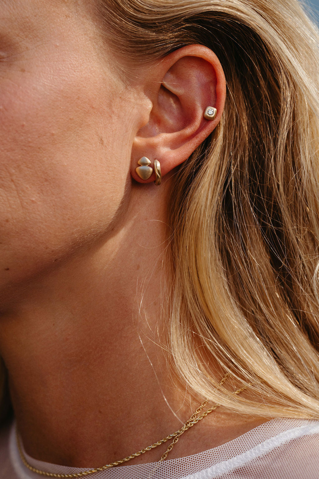 Narrow Dune Clicker Huggies - Gold in second hole earring stack