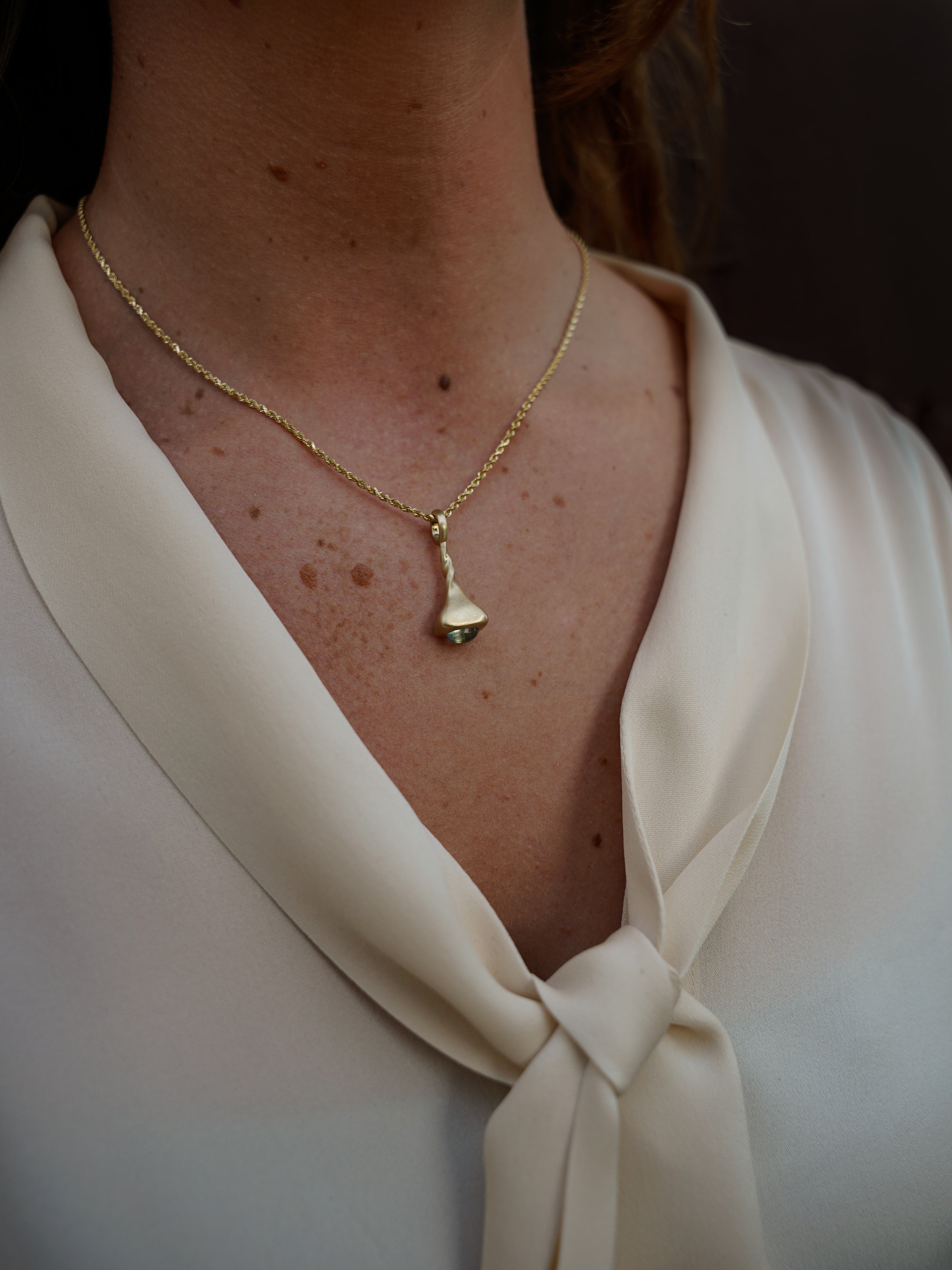 Okay Fine Gold Pendulum Charms On Model