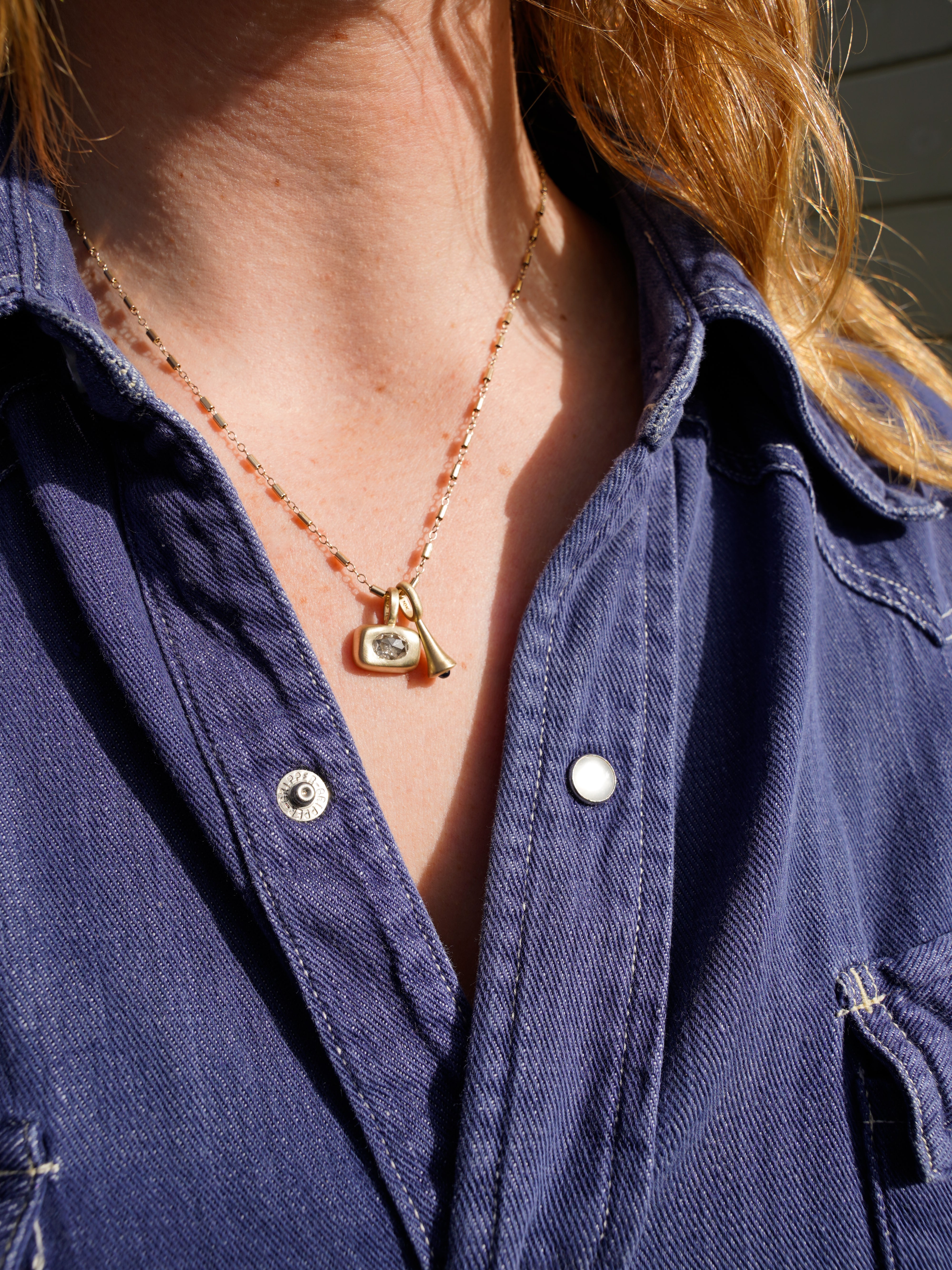 Oval rose cut champagne Diamond Horizontal Trove Charm - Gold on model with mini pendulum charm