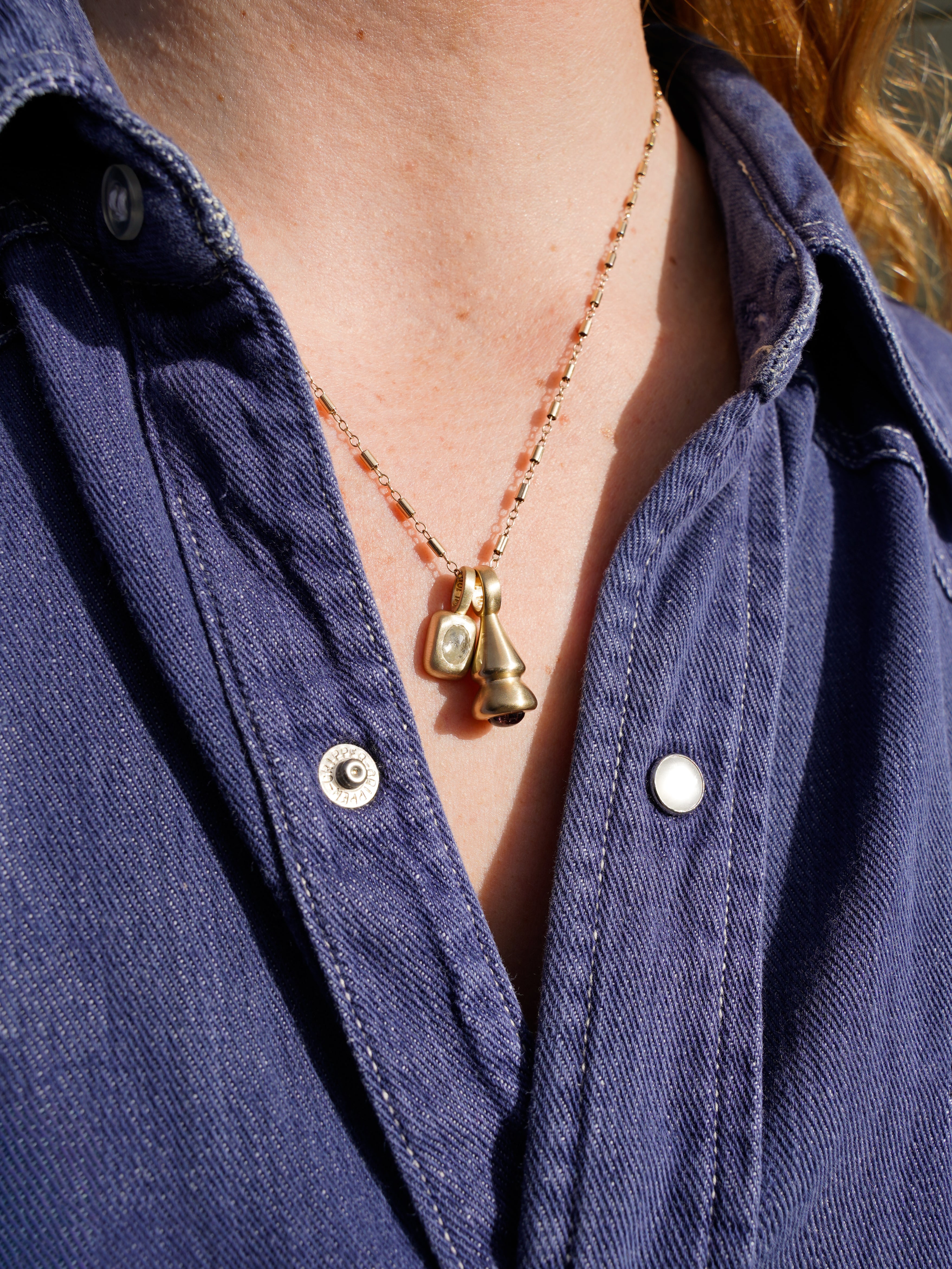 Oval Diamond Vertical Trove Charm - Gold on model with pendulum charm