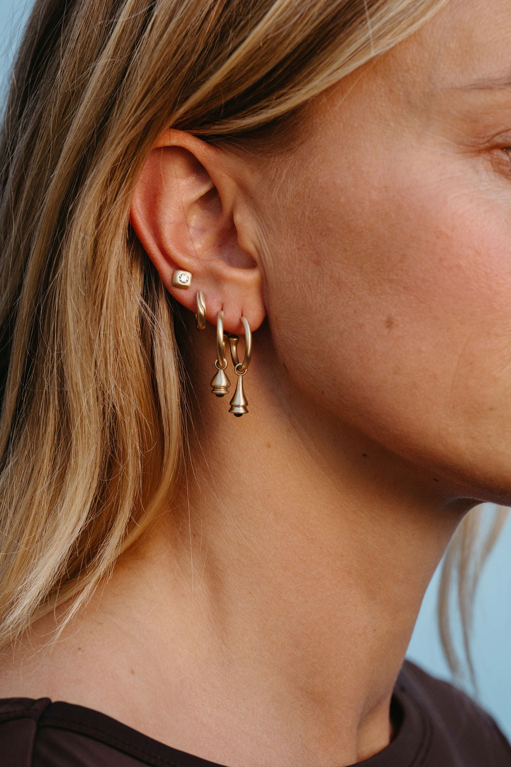 Emerald and Sapphire Pendulum Charm Hoop Earring - Gold in earring stack