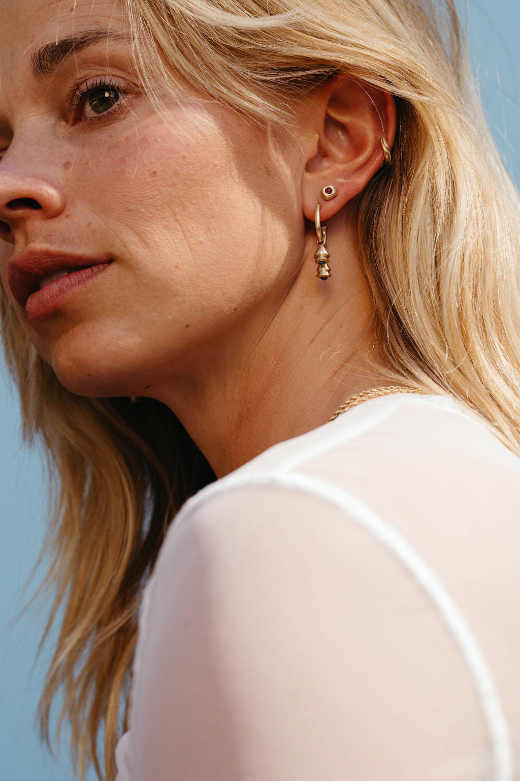 Emerald and Sapphire Pendulum Charm Hoop Earring - Gold in earring stack