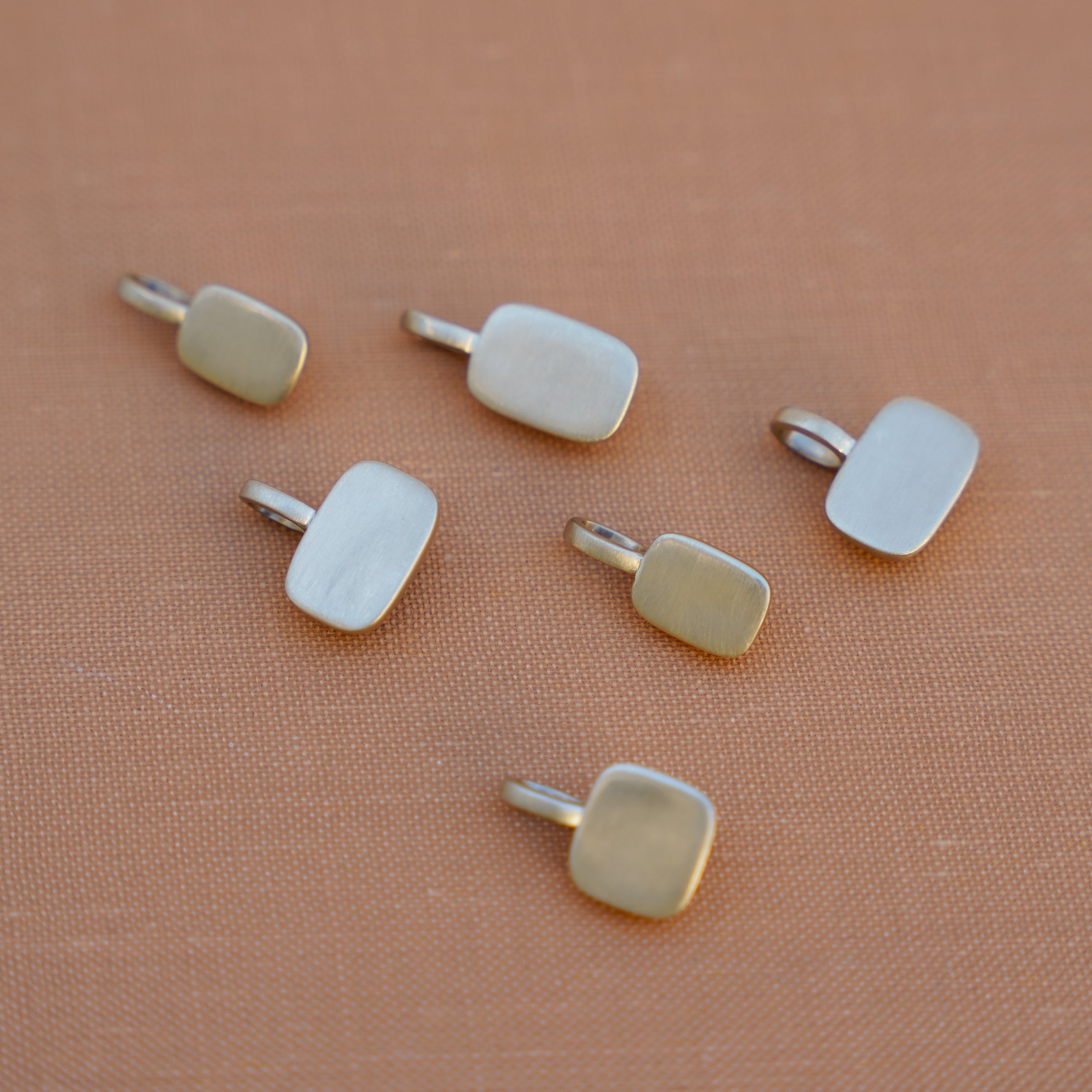 solid gold back of trove charms