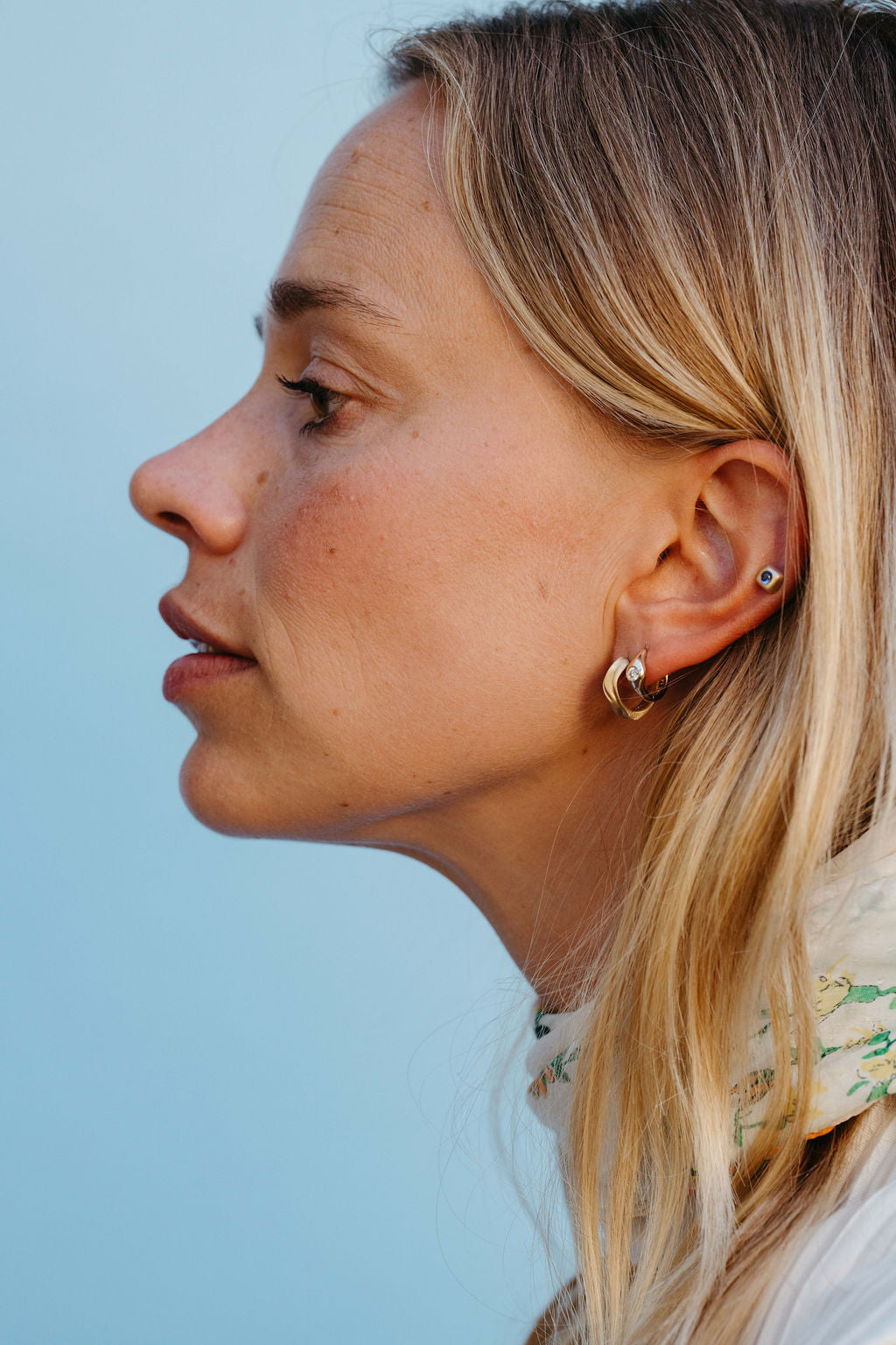 Wide Dune Clicker Huggie Hoop - Gold earring stack