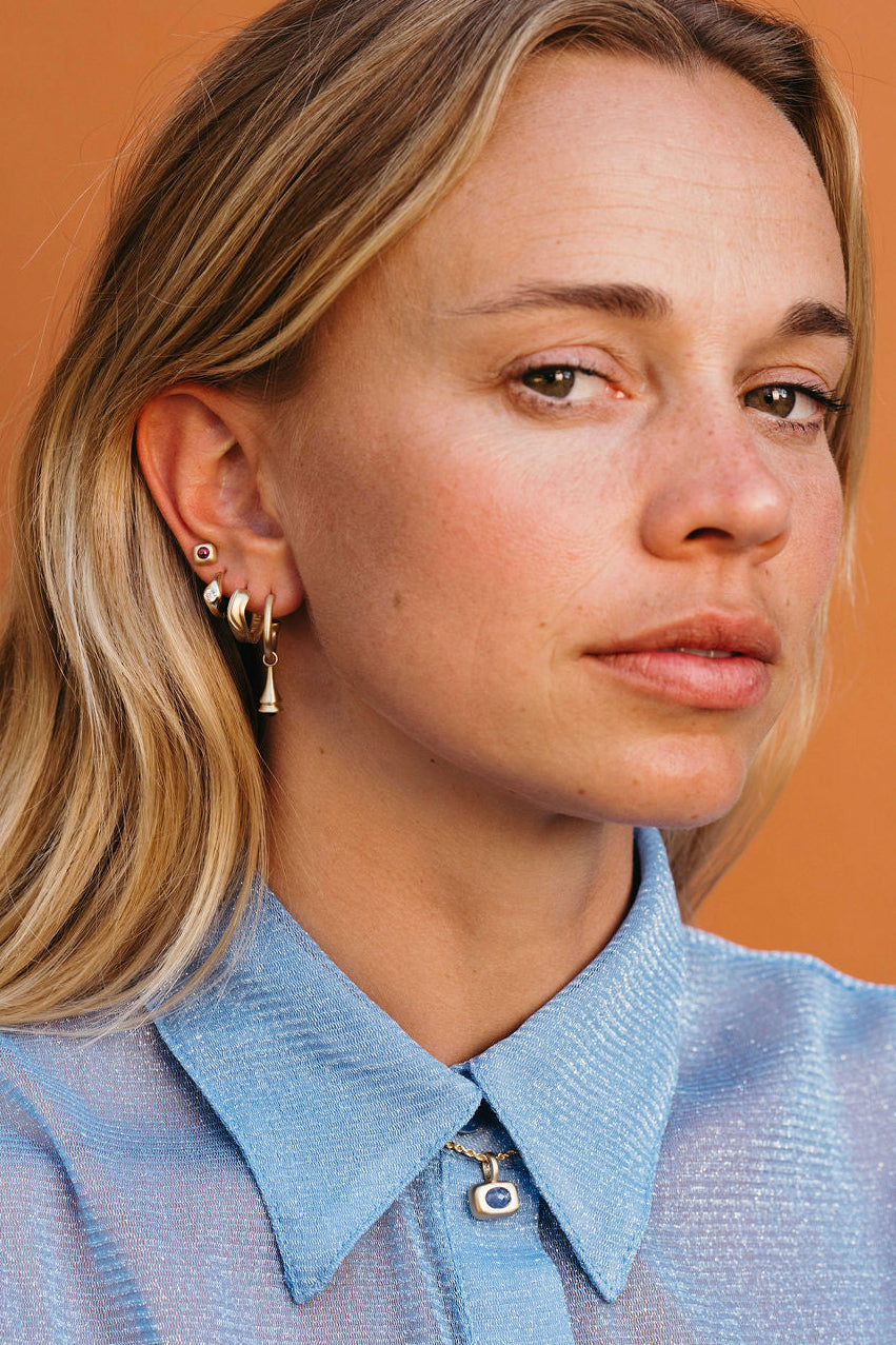 Wide Dune Clicker Huggie Hoop - Gold earring stack